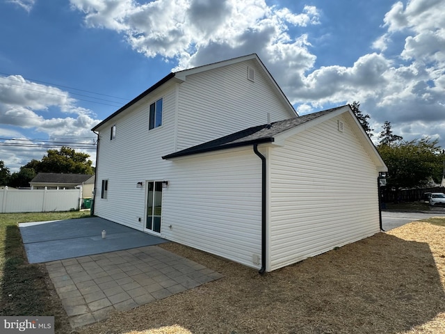 view of home's exterior with a patio