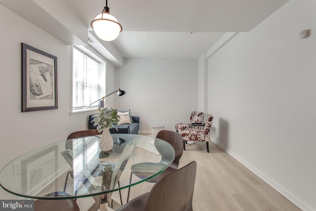 dining space featuring light wood-type flooring