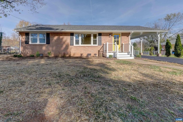 view of front of house featuring a carport