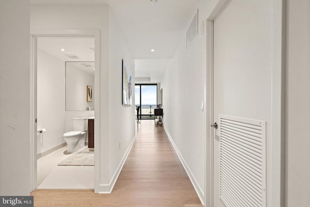 hall featuring light hardwood / wood-style floors