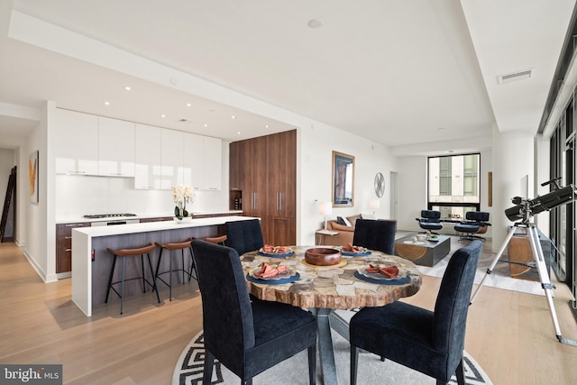 dining room featuring light wood-type flooring