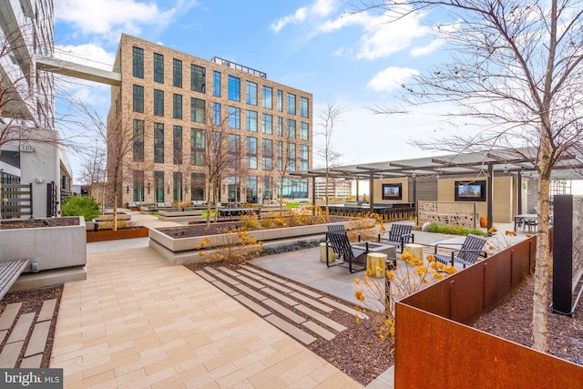 exterior space with a patio and an outdoor fire pit