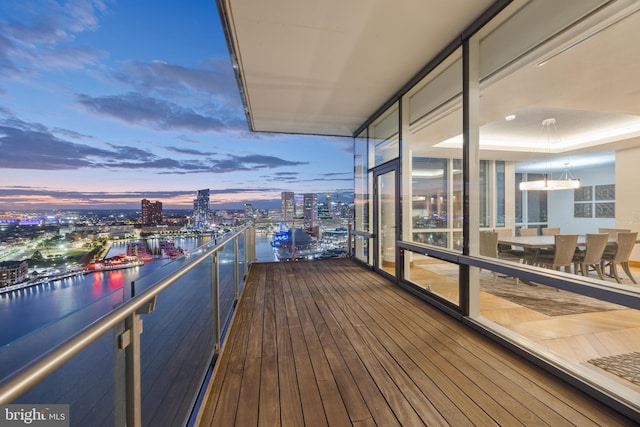 view of balcony at dusk