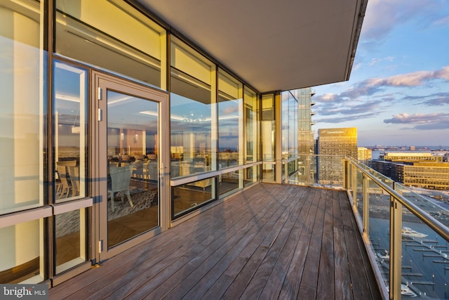 view of balcony at dusk