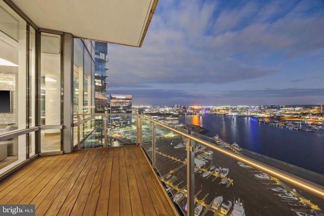 balcony at dusk with a water view