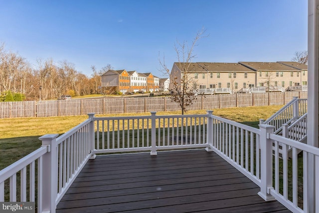 deck featuring a lawn