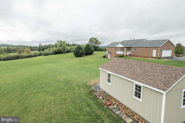 view of yard with a garage