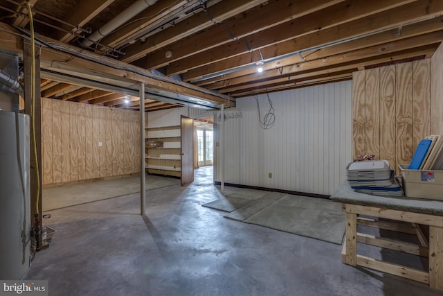 basement featuring water heater