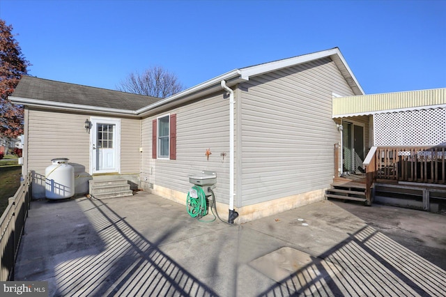 rear view of house with a patio