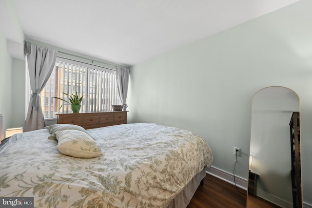 800 4th St SW Unit S312, Washington, DC 20024 - bedroom with dark wood finished floors and baseboards