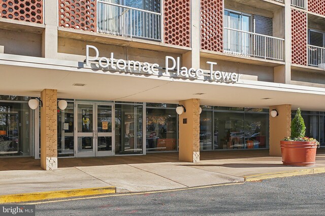 800 4th St SW Unit S312, Washington, DC 20024 - view of apartment building / complex featuring uncovered parking