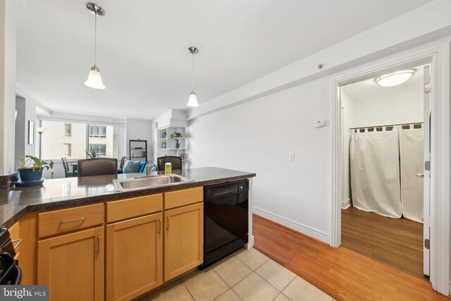 800 4th St SW Unit S312, Washington, DC 20024 - living room featuring wood finished floors and baseboards