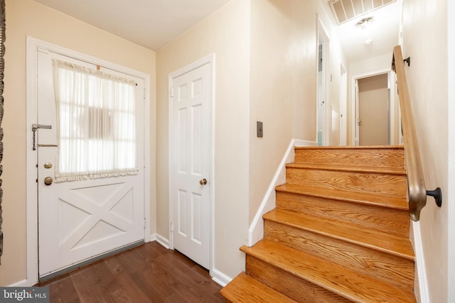 doorway to outside with dark hardwood / wood-style flooring