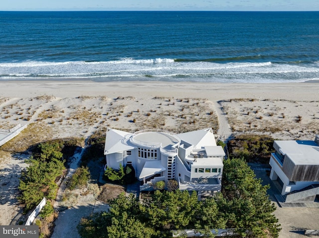 drone / aerial view with a view of the beach and a water view