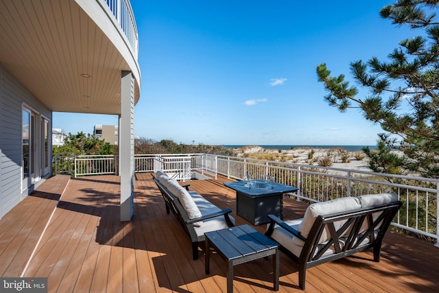 wooden terrace with outdoor lounge area