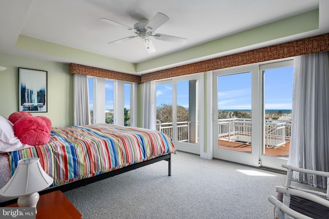 bedroom featuring access to exterior, carpet floors, and ceiling fan