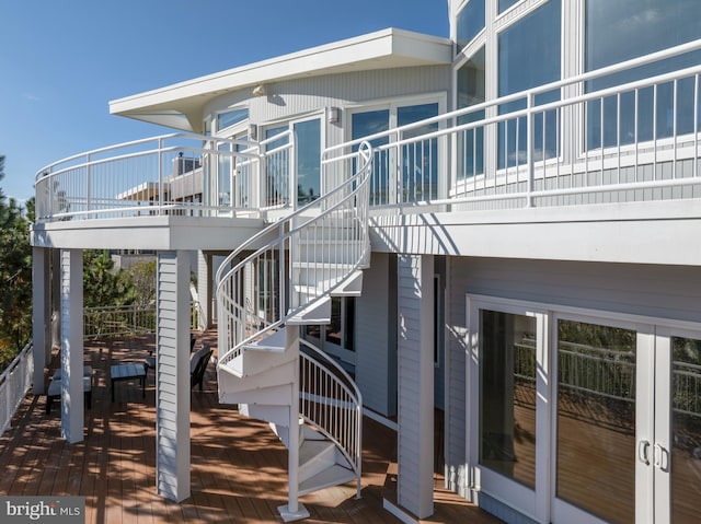 101-E Long Beach Blvd, Long Beach Township, NJ 08008 - view of property exterior with stairway and a wooden deck