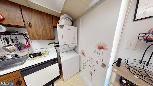 washroom with stacked washer and clothes dryer