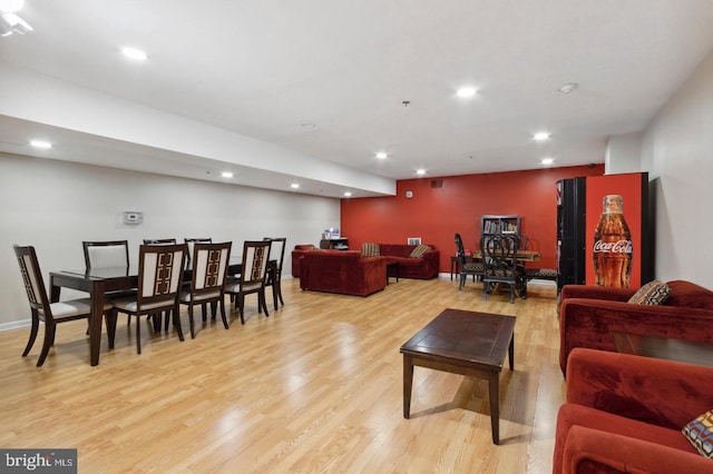 living room with light hardwood / wood-style floors