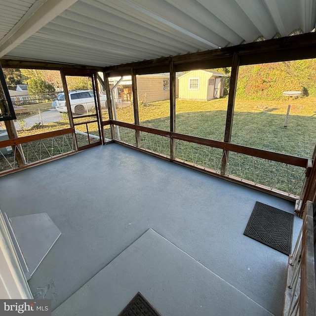 unfurnished sunroom featuring a healthy amount of sunlight