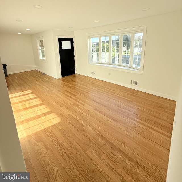 entryway with light hardwood / wood-style flooring