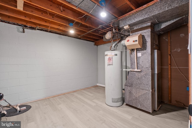 utility room with gas water heater