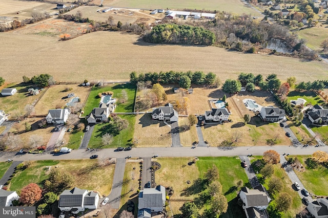 birds eye view of property featuring a rural view