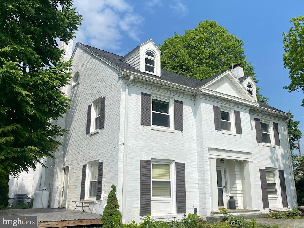 view of front of house featuring central AC