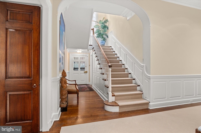 entrance foyer with dark hardwood / wood-style flooring