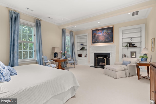 carpeted bedroom featuring ornamental molding