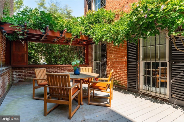 wooden terrace featuring a pergola