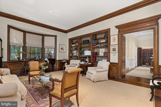 living room with light wood-type flooring and crown molding