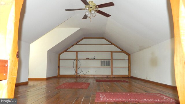 bonus room featuring hardwood / wood-style floors, vaulted ceiling, and ceiling fan