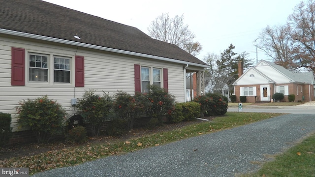312 W Central Ave, Federalsburg, MD 21632 - view of home's exterior with a shingled roof