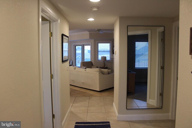 18 41st St Unit 304, Ocean City, MD 21842 - corridor featuring light tile patterned floors and baseboards