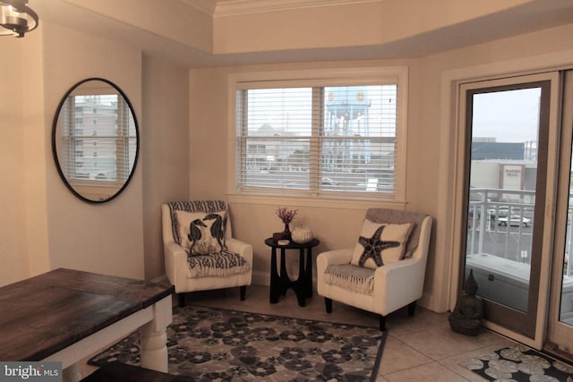 18 41st St Unit 304, Ocean City, MD 21842 - sitting room with light tile patterned floors and crown molding