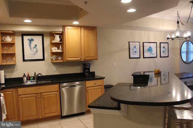18 41st St Unit 304, Ocean City, MD 21842 - kitchen featuring stainless steel dishwasher, a tray ceiling, a sink, open shelves, and a breakfast bar area