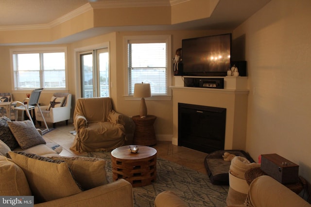 living room featuring light tile patterned floors, a wealth of natural light, and crown molding