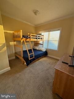 carpeted bedroom with crown molding