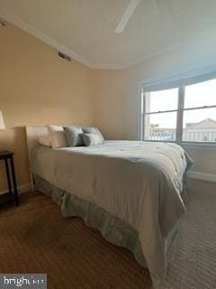 18 41st St Unit 304, Ocean City, MD 21842 - carpeted bedroom featuring baseboards, ceiling fan, and crown molding