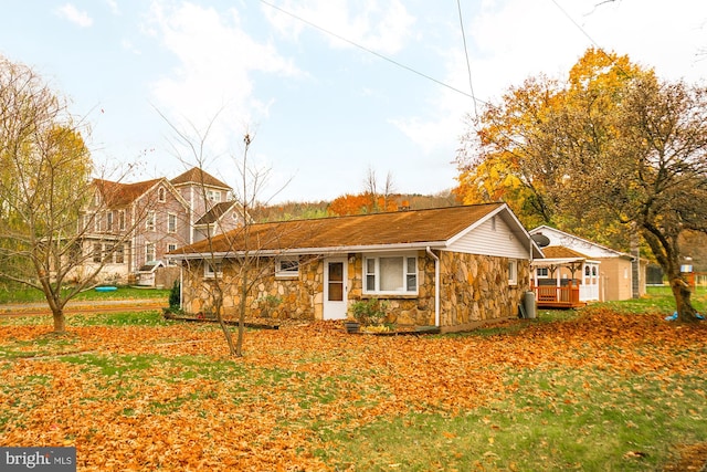 view of front of property with a deck