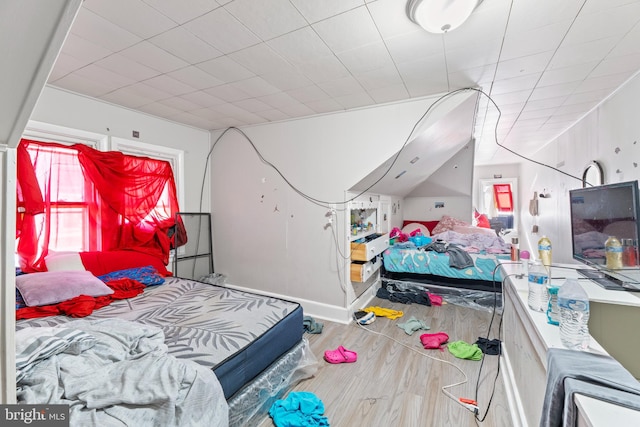 bedroom featuring wood-type flooring