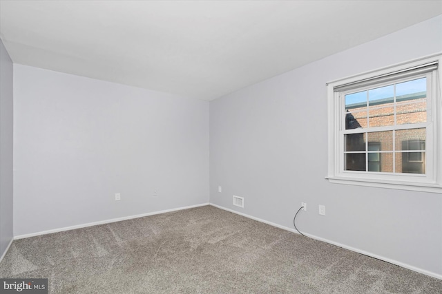 view of carpeted spare room