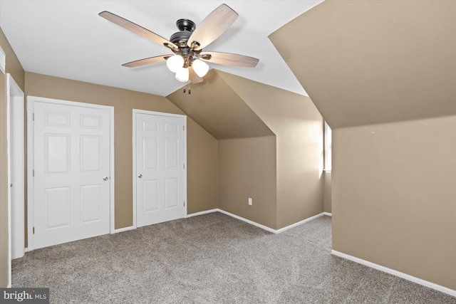 bonus room featuring carpet flooring, ceiling fan, and vaulted ceiling