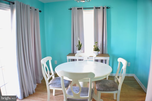 dining space featuring light hardwood / wood-style floors