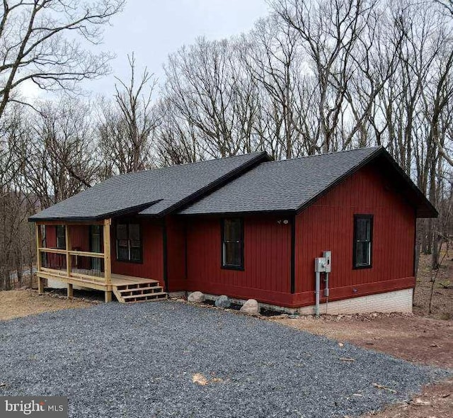 598 Honey Locust Ln, Great Cacapon, WV 25422 - view of front of home featuring a shingled roof and a porch