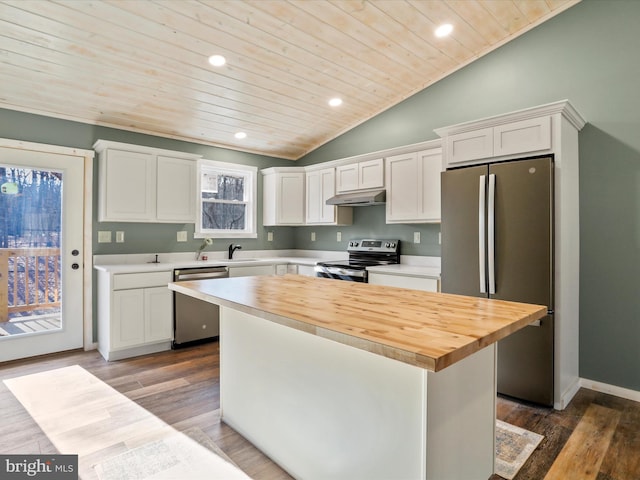 598 Honey Locust Ln, Great Cacapon, WV 25422 - kitchen with stainless steel appliances, under cabinet range hood, wooden ceiling, lofted ceiling, and a kitchen island