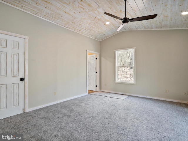 carpeted empty room featuring vaulted ceiling, ceiling fan, and wood ceiling