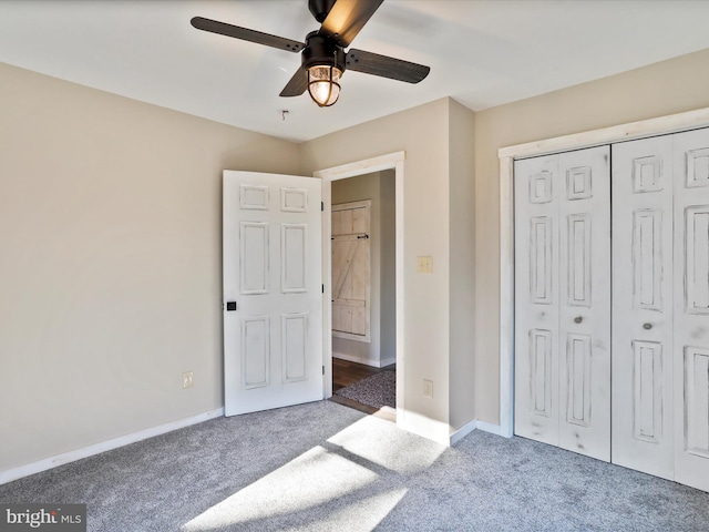 598 Honey Locust Ln, Great Cacapon, WV 25422 - unfurnished bedroom featuring carpet floors, a closet, baseboards, and a ceiling fan