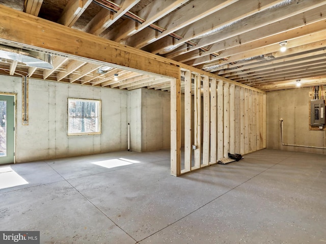 basement featuring electric panel